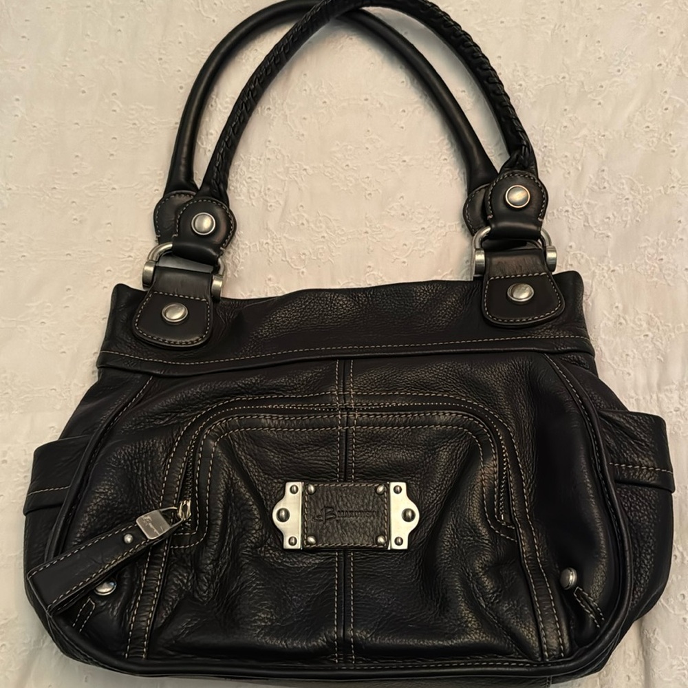 B. Makowski black leather bag 13 x 11 x 3” with 9” shoulder drop
Genuine leather
